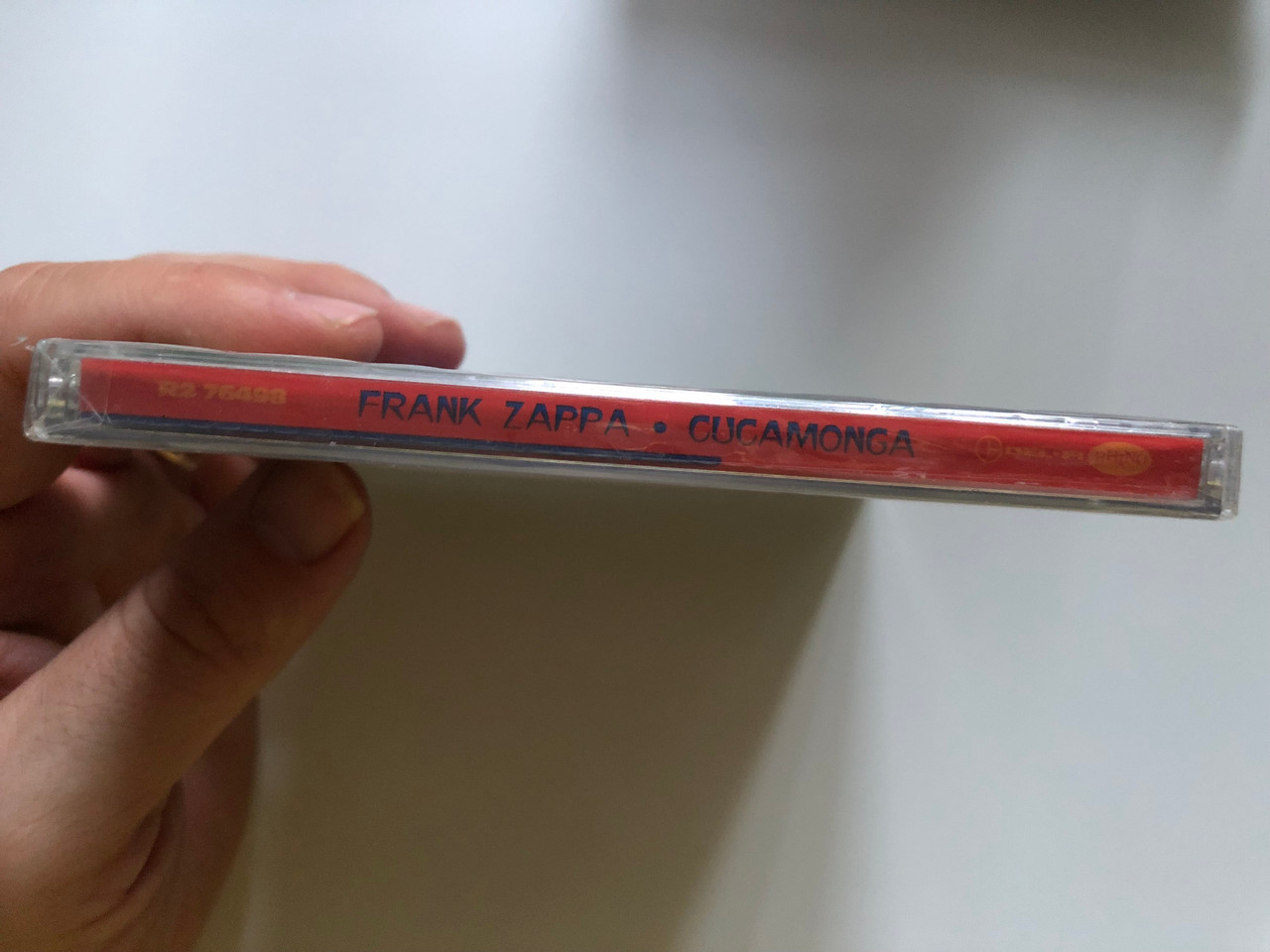 https://cdn10.bigcommerce.com/s-62bdpkt7pb/products/0/images/241202/Frank_Zappa_Cucamonga_Franks_Wild_Years_Rare_Zappa-Related_Singles_From_The_Rotations_Bob_Guy_and_More_Plus_3_Tracks_Now_Available_for_the_First_Time_in_the_U.S._Rhino_Records_Au_3__03956.1658424859.1280.1280.JPG?c=2&_gl=1*1fo74uv*_ga*MjA2NTIxMjE2MC4xNTkwNTEyNTMy*_ga_WS2VZYPC6G*MTY1ODQxNTU2NS40OTMuMS4xNjU4NDI0NjcyLjUz