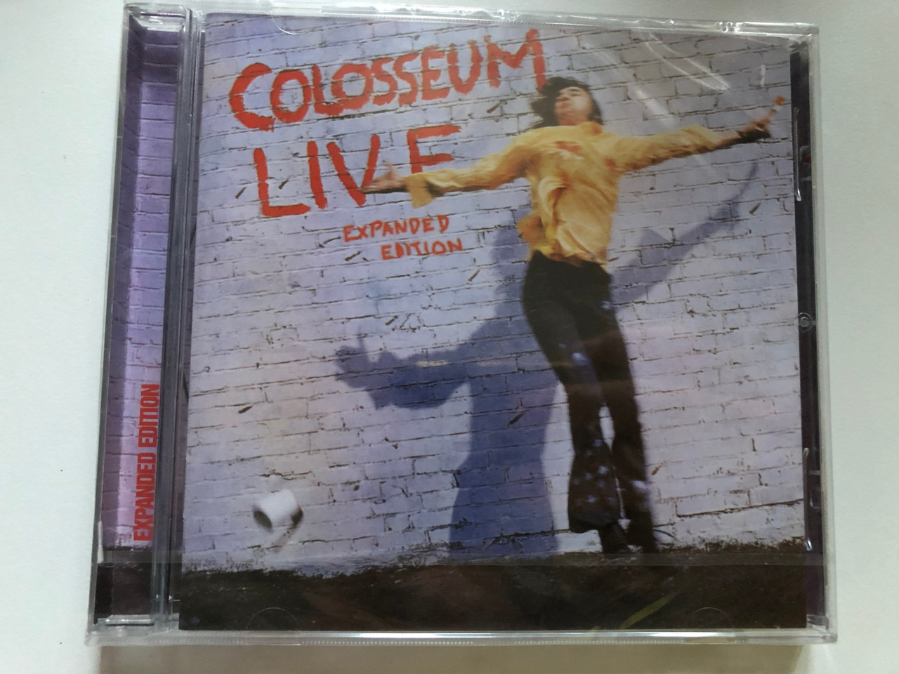 https://cdn10.bigcommerce.com/s-62bdpkt7pb/products/0/images/241217/Colosseum_Live_Expanded_Edition_Sanctuary_Midline_Audio_CD_2004_SMRCD118_1__23408.1658426160.1280.1280.JPG?c=2&_gl=1*1d01zi*_ga*MjA2NTIxMjE2MC4xNTkwNTEyNTMy*_ga_WS2VZYPC6G*MTY1ODQxNTU2NS40OTMuMS4xNjU4NDI2MTU4LjYw