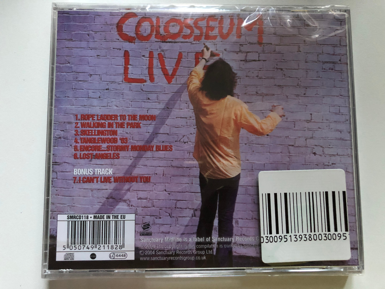 https://cdn10.bigcommerce.com/s-62bdpkt7pb/products/0/images/241218/Colosseum_Live_Expanded_Edition_Sanctuary_Midline_Audio_CD_2004_SMRCD118_2__93134.1658426169.1280.1280.JPG?c=2&_gl=1*1d01zi*_ga*MjA2NTIxMjE2MC4xNTkwNTEyNTMy*_ga_WS2VZYPC6G*MTY1ODQxNTU2NS40OTMuMS4xNjU4NDI2MTU4LjYw