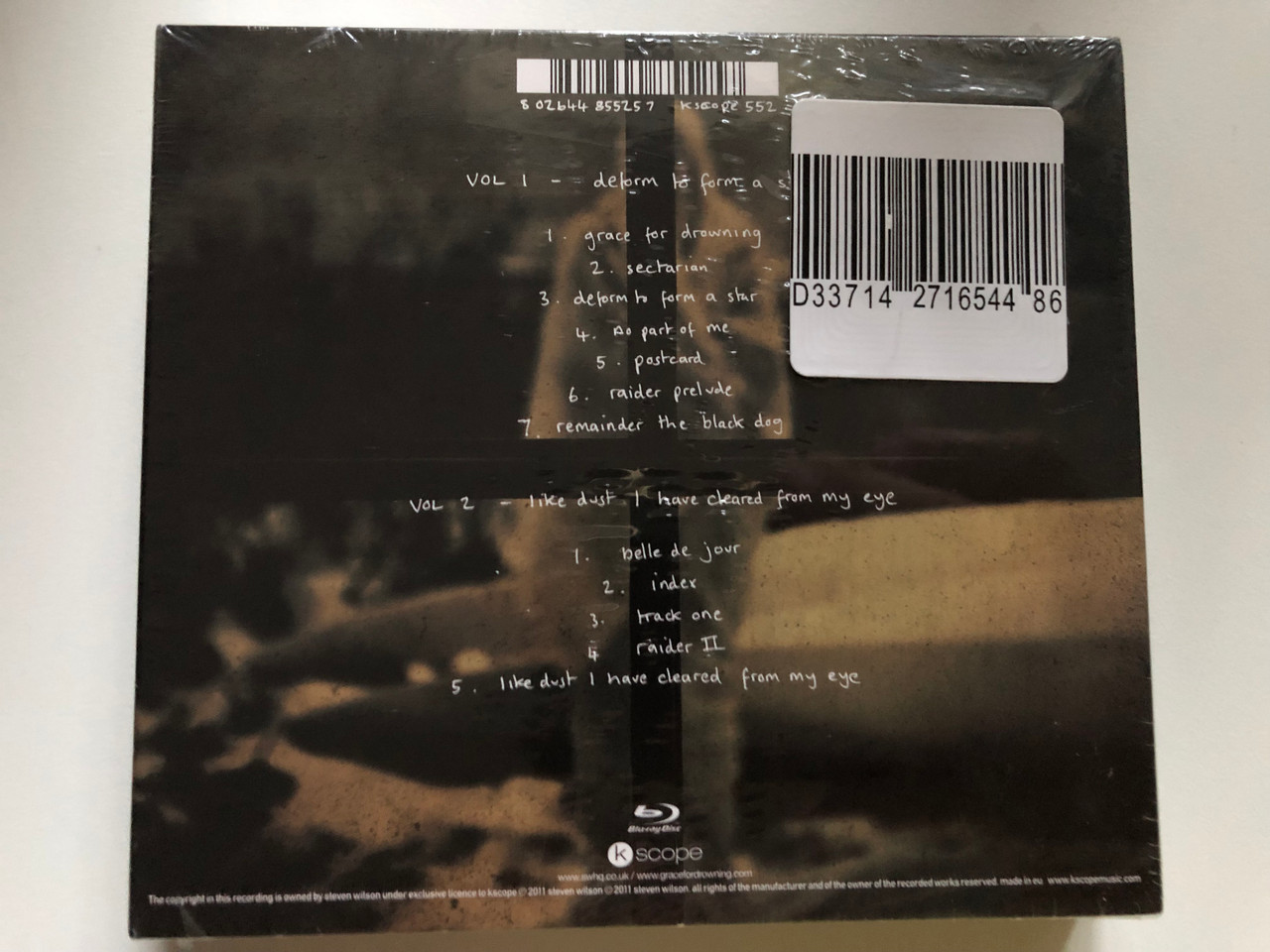https://cdn10.bigcommerce.com/s-62bdpkt7pb/products/0/images/241457/Steven_Wilson_Grace_For_Drowning_2CD_Blu-ray_edition_of_the_second_album_from_the_twice_Grammy_nominated_producer_writter_and_performer._Kscope_2x_Audio_CD_2011_Kscope_552_2__53303.1658496152.1280.1280.JPG?c=2&_gl=1*1dywj2o*_ga*MjA2NTIxMjE2MC4xNTkwNTEyNTMy*_ga_WS2VZYPC6G*MTY1ODQ5NTQ2MC40OTUuMS4xNjU4NDk1NTA2LjE0