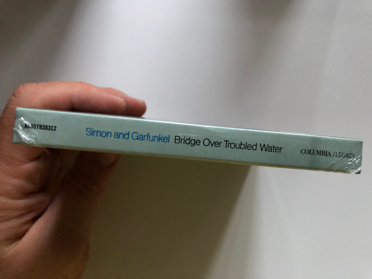 https://cdn10.bigcommerce.com/s-62bdpkt7pb/products/0/images/241478/Simon_And_Garfunkel_Bridge_Over_Troubled_Water_Columbia_2x_Audio_CD_2011_88697828312_3__48204.1658500528.1280.1280.JPG?c=2&_gl=1*1n0fhed*_ga*MjA2NTIxMjE2MC4xNTkwNTEyNTMy*_ga_WS2VZYPC6G*MTY1ODQ5NTQ2MC40OTUuMS4xNjU4NTAwMzgzLjM1