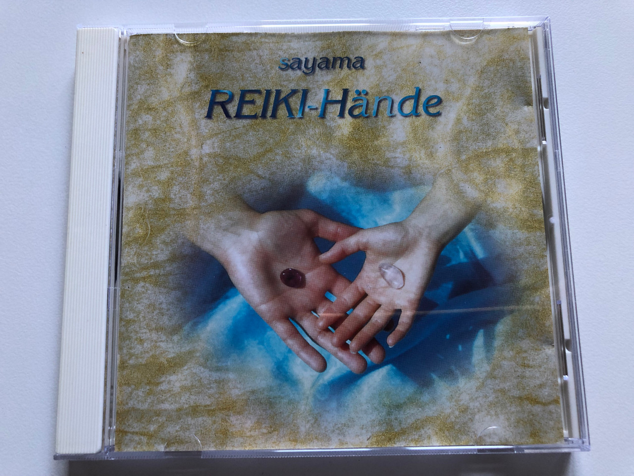 https://cdn10.bigcommerce.com/s-62bdpkt7pb/products/0/images/242274/Sayama_REIKI-Hands_Sayama-Music_Audio_CD_1997_SM_0033_1__44034.1658744269.1280.1280.JPG?c=2&_gl=1*r90bdk*_ga*MjA2NTIxMjE2MC4xNTkwNTEyNTMy*_ga_WS2VZYPC6G*MTY1ODczMDA4My40OTYuMS4xNjU4NzQ0MTg0LjUx