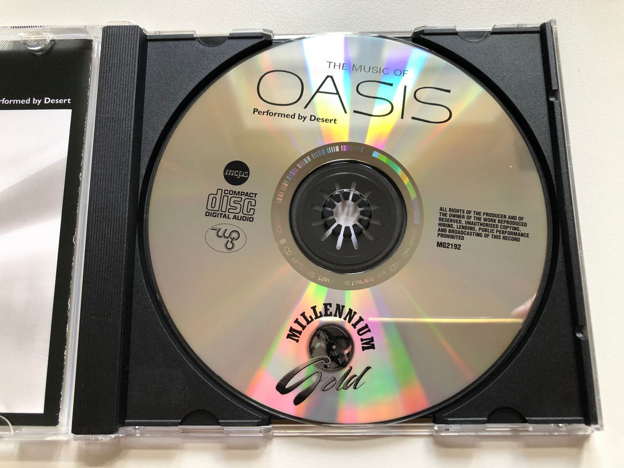 https://cdn10.bigcommerce.com/s-62bdpkt7pb/products/0/images/242718/The_Music_Of_Oasis_-_Performed_By_Desert_Let_There_Be_Love_Wonderwall_Be_Here_Now_Dyou_Know_What_I_Mean_Lyla_Millenium_Gold_Audio_CD_2006_MG2192_3__39557.1658823059.1280.1280.JPG?c=2&_gl=1*1ouqc2y*_ga*MjA2NTIxMjE2MC4xNTkwNTEyNTMy*_ga_WS2VZYPC6G*MTY1ODgxMTM2Mi40OTcuMS4xNjU4ODIyODcyLjM4