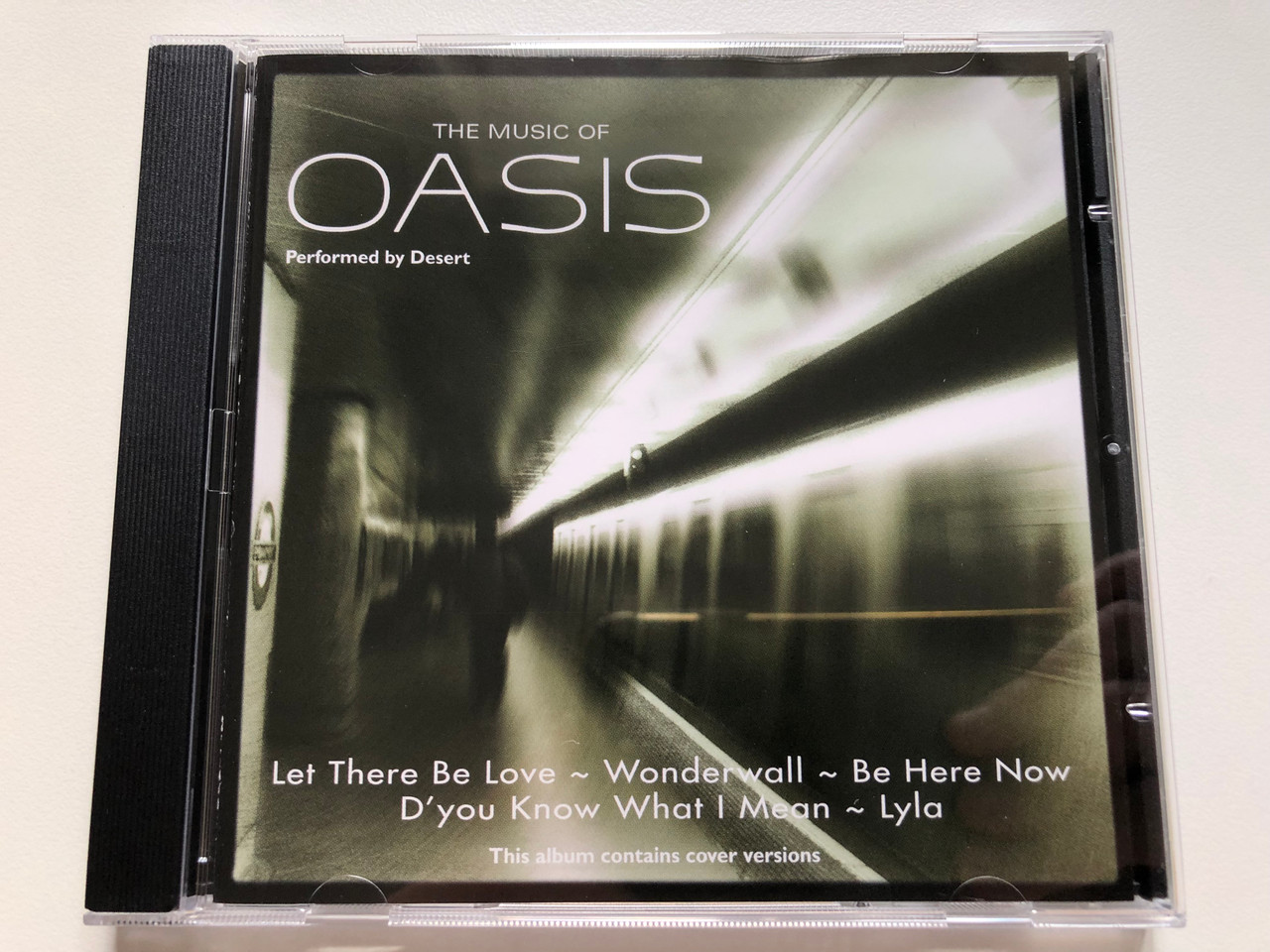 https://cdn10.bigcommerce.com/s-62bdpkt7pb/products/0/images/242719/The_Music_Of_Oasis_-_Performed_By_Desert_Let_There_Be_Love_Wonderwall_Be_Here_Now_Dyou_Know_What_I_Mean_Lyla_Millenium_Gold_Audio_CD_2006_MG2192_1__74988.1658823060.1280.1280.JPG?c=2&_gl=1*1ouqc2y*_ga*MjA2NTIxMjE2MC4xNTkwNTEyNTMy*_ga_WS2VZYPC6G*MTY1ODgxMTM2Mi40OTcuMS4xNjU4ODIyODcyLjM4