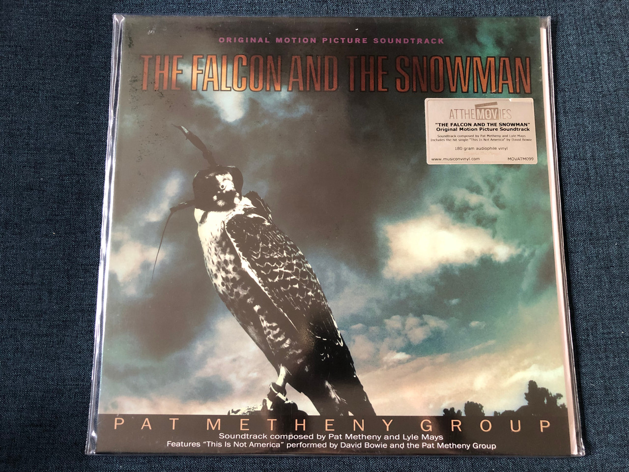 https://cdn10.bigcommerce.com/s-62bdpkt7pb/products/0/images/243206/The_Falcon_And_The_Snowman_Original_Motion_Picture_Soundtrack_-_Pat_Metheny_Group_Soundtrack_composed_by_Pat_Metheny_and_Lyle_Mays_Features_This_Is_Not_America_performed_by_David_Bow_1__47455.1658931234.1280.1280.JPG?c=2&_gl=1*1ubjq36*_ga*MjA2NTIxMjE2MC4xNTkwNTEyNTMy*_ga_WS2VZYPC6G*MTY1ODkyOTg1NC41MDAuMS4xNjU4OTMxMTc1LjM4