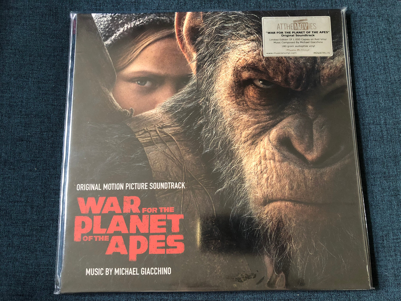 https://cdn10.bigcommerce.com/s-62bdpkt7pb/products/0/images/243217/War_For_The_Planet_Of_The_Apes_Original_Motion_Picture_Soundtrack_-_Music_By_Michael_Giacchino_Limited_Edition_Of_1.000_Copies_on_Red_Vinyl_180_gram_audiophile_vinyl_At_The_Movies_Musi_1__96223.1658932455.1280.1280.JPG?c=2&_gl=1*1bciu8o*_ga*MjA2NTIxMjE2MC4xNTkwNTEyNTMy*_ga_WS2VZYPC6G*MTY1ODkyOTg1NC41MDAuMS4xNjU4OTMyNDQyLjYw