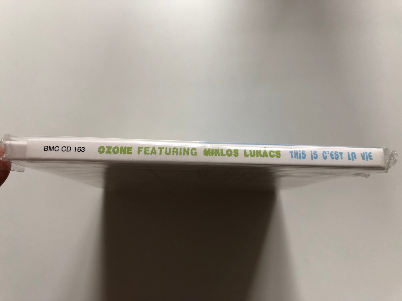 https://cdn10.bigcommerce.com/s-62bdpkt7pb/products/0/images/243716/Ozone_Featuring_Mikls_Lukcs_This_Is_Cest_La_Vie_Budapest_Music_Center_Records_Audio_CD_2010_BMC_CD_163_3__88256.1659066082.1280.1280.JPG?c=2&_gl=1*1m099h5*_ga*MjA2NTIxMjE2MC4xNTkwNTEyNTMy*_ga_WS2VZYPC6G*MTY1OTA2NDkyMC41MDQuMS4xNjU5MDY1OTk0LjQz