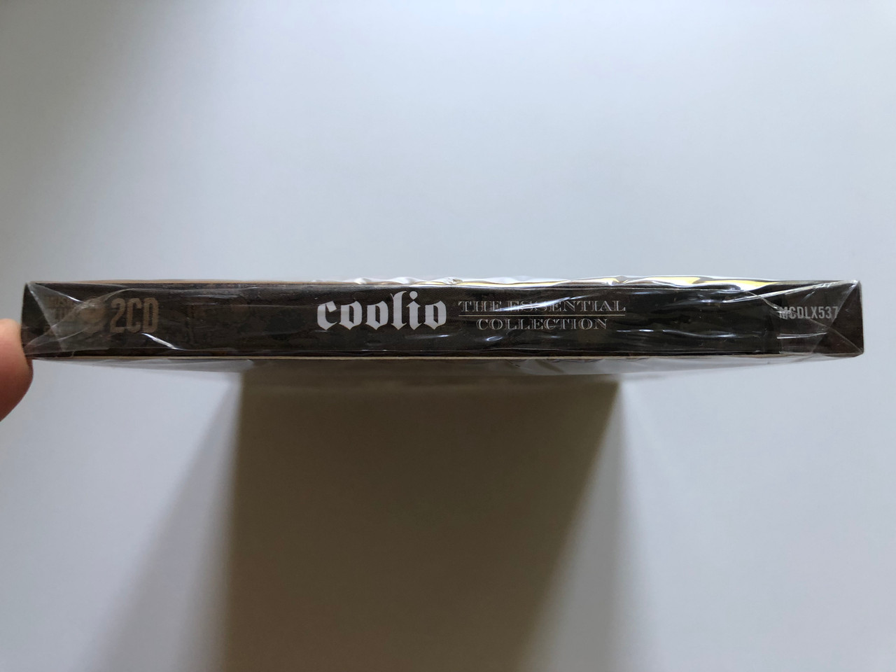 https://cdn10.bigcommerce.com/s-62bdpkt7pb/products/0/images/243785/Coolio_The_Essential_Collection_Rhino_Records_2x_Audio_CD_2012_MCDLX537_3__69185.1659071433.1280.1280.JPG?c=2&_gl=1*1go3eks*_ga*MjA2NTIxMjE2MC4xNTkwNTEyNTMy*_ga_WS2VZYPC6G*MTY1OTA2NDkyMC41MDQuMS4xNjU5MDcxMTU5LjE.
