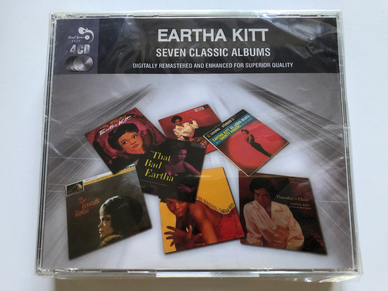 https://cdn10.bigcommerce.com/s-62bdpkt7pb/products/0/images/243792/Eartha_Kitt_Seven_Classic_Albums_Digitally_Remastered_And_Enhanced_For_Superior_Quality_Real_Gone_Jazz_Real_Gone_4x_Audio_CD_RGJCD391_1__77864.1659071952.1280.1280.JPG?c=2&_gl=1*1v6l79*_ga*MjA2NTIxMjE2MC4xNTkwNTEyNTMy*_ga_WS2VZYPC6G*MTY1OTA2NDkyMC41MDQuMS4xNjU5MDcxNjMyLjU3