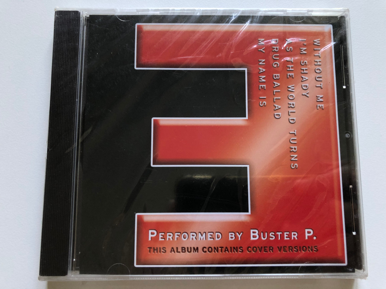 https://cdn10.bigcommerce.com/s-62bdpkt7pb/products/0/images/244300/The_Music_Of_Eminem_-_Performed_by_Buster_P._This_Album_Contains_Cover_Versions_Without_Me_Im_Shady_As_The_World_Turns_Drug_Ballad_My_Name_Is_Millennium_Gold_Audio_CD_2002_MG2136_1__53918.1659364006.1280.1280.JPG?c=2&_gl=1*19lzt6m*_ga*MjA2NTIxMjE2MC4xNTkwNTEyNTMy*_ga_WS2VZYPC6G*MTY1OTM2MTk0MC41MDcuMS4xNjU5MzYzNzQyLjIx