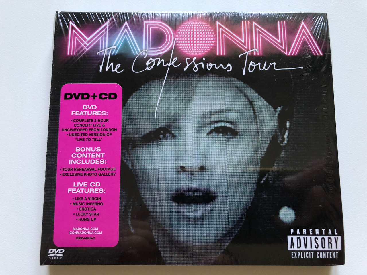 https://cdn10.bigcommerce.com/s-62bdpkt7pb/products/0/images/244338/Madonna_-_The_Confessions_Tour_DVD_CD_DVD_Features_Complete_2-Hour_Concert_Live_Uncensored_From_London_Unedited_Version_Of_Live_To_Tell_Warner_Bros._Records_DVD_Video_CD_2007_75_1__21888.1659369534.1280.1280.JPG?c=2&_gl=1*etbjb*_ga*MjA2NTIxMjE2MC4xNTkwNTEyNTMy*_ga_WS2VZYPC6G*MTY1OTM2MTk0MC41MDcuMS4xNjU5MzY5MzEyLjYw