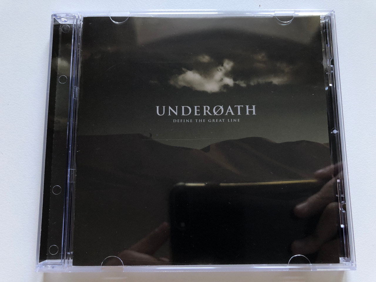 https://cdn10.bigcommerce.com/s-62bdpkt7pb/products/0/images/244653/Underoath_Define_The_Great_Line_Tooth_Nail_Records_Audio_CD_2006_094634265829_1__09727.1659440914.1280.1280.JPG?c=2&_gl=1*14gqt7a*_ga*MjA2NTIxMjE2MC4xNTkwNTEyNTMy*_ga_WS2VZYPC6G*MTY1OTQzOTk1Mi41MDguMS4xNjU5NDQwODAwLjYw