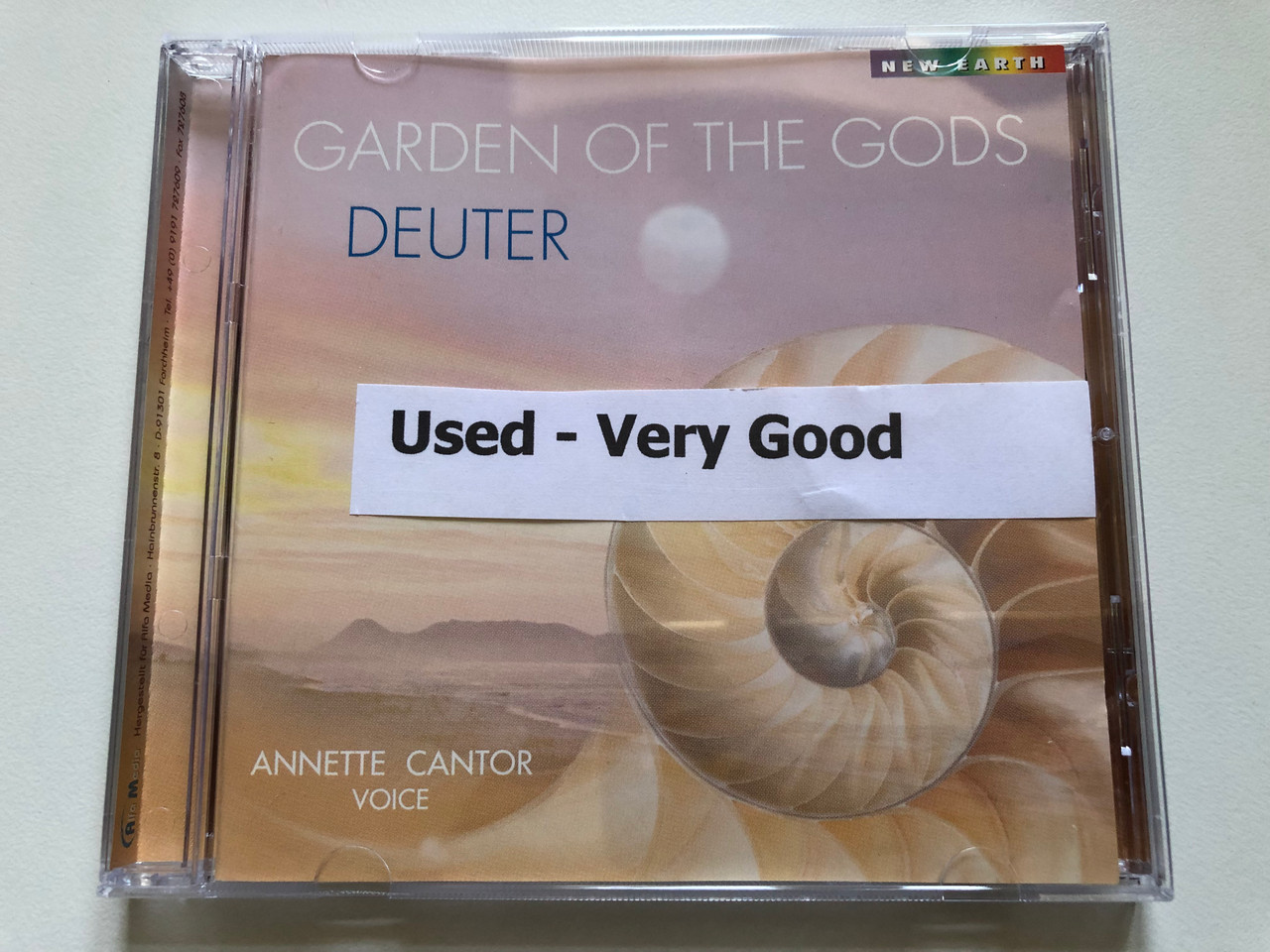 https://cdn10.bigcommerce.com/s-62bdpkt7pb/products/0/images/244775/Garden_Of_The_Gods_-_Deuter_-_Annette_Cantor_voice_New_Earth_Records_Audio_CD_1999_CD_77139_8__16376.1659444966.1280.1280.JPG?c=2&_gl=1*z5ynhi*_ga*MjA2NTIxMjE2MC4xNTkwNTEyNTMy*_ga_WS2VZYPC6G*MTY1OTQzOTk1Mi41MDguMS4xNjU5NDQ0ODQ1Ljc.