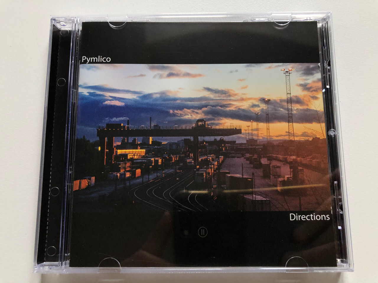 https://cdn10.bigcommerce.com/s-62bdpkt7pb/products/0/images/245756/Pymlico_Directions_Spider_House_Records_Audio_CD_2012_SHRCD003_1__96974.1659607565.1280.1280.JPG?c=2&_gl=1*1vjqghn*_ga*MjA2NTIxMjE2MC4xNTkwNTEyNTMy*_ga_WS2VZYPC6G*MTY1OTYwMTIyMS41MTMuMS4xNjU5NjA3NDQyLjIx