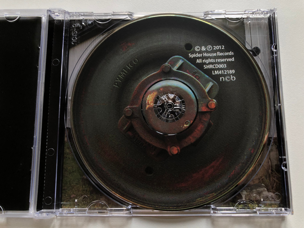https://cdn10.bigcommerce.com/s-62bdpkt7pb/products/0/images/245759/Pymlico_Directions_Spider_House_Records_Audio_CD_2012_SHRCD003_3__04375.1659607566.1280.1280.JPG?c=2&_gl=1*1vjqghn*_ga*MjA2NTIxMjE2MC4xNTkwNTEyNTMy*_ga_WS2VZYPC6G*MTY1OTYwMTIyMS41MTMuMS4xNjU5NjA3NDQyLjIx