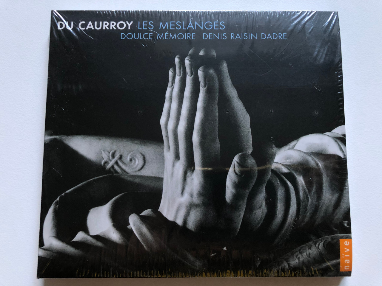 https://cdn10.bigcommerce.com/s-62bdpkt7pb/products/0/images/246712/Du_Caurroy_-_Les_Meslanges_Doulce_Mmoire_-_Denis_Raisin-Dadre_Nave_Audio_CD_2005_E9800_1__52303.1659939291.1280.1280.JPG?c=2&_gl=1*tb9b7s*_ga*MjA2NTIxMjE2MC4xNTkwNTEyNTMy*_ga_WS2VZYPC6G*MTY1OTkzNzgxMy41MTkuMS4xNjU5OTM5MjU5LjYw