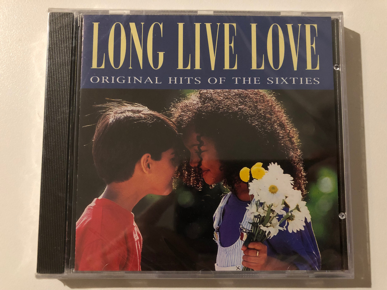 https://cdn10.bigcommerce.com/s-62bdpkt7pb/products/0/images/247278/Long_Live_Love_-_Original_Hits_Of_The_Sixties_Pulse_Audio_CD_1997_PLS_CD_234_1__43499.1660102835.1280.1280.JPG?c=2&_gl=1*3gwc0d*_ga*MjA2NTIxMjE2MC4xNTkwNTEyNTMy*_ga_WS2VZYPC6G*MTY2MDEwMTI3OS41MjMuMS4xNjYwMTAyNTUyLjUx