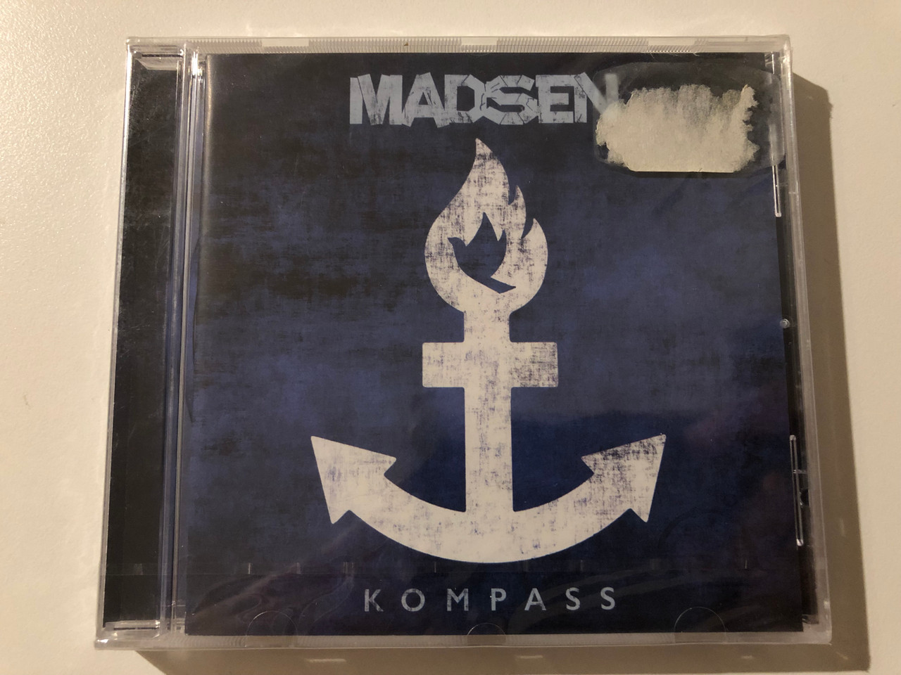 https://cdn10.bigcommerce.com/s-62bdpkt7pb/products/0/images/247298/Madsen_Kompass_Four_Music_Audio_CD_2015_88875087312_1__49445.1660104918.1280.1280.JPG?c=2&_gl=1*12diqvi*_ga*MjA2NTIxMjE2MC4xNTkwNTEyNTMy*_ga_WS2VZYPC6G*MTY2MDEwMTI3OS41MjMuMS4xNjYwMTA0NzU0LjUx