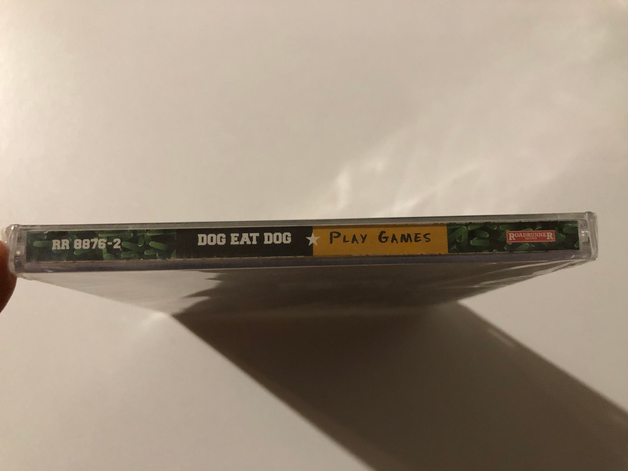 https://cdn10.bigcommerce.com/s-62bdpkt7pb/products/0/images/247328/Dog_Eat_Dog_Play_Games_Roadrunner_Records_Audio_CD_1996_RR_8876-2_3__04836.1660107279.1280.1280.JPG?c=2&_gl=1*1vehm92*_ga*MjA2NTIxMjE2MC4xNTkwNTEyNTMy*_ga_WS2VZYPC6G*MTY2MDEwMTI3OS41MjMuMS4xNjYwMTA3MTA4LjQz