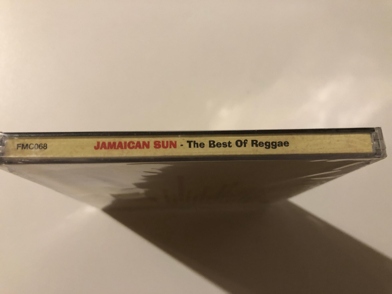 https://cdn10.bigcommerce.com/s-62bdpkt7pb/products/0/images/247381/Jamaican_Sun_-_The_Best_Of_Reggae_Featuring_Bob_Marley_Desmond_Dekker_Soulful_Dynamics_and_many_more..._FMCG_Audio_CD_1997_FMC068_3__92745.1660114977.1280.1280.JPG?c=2&_gl=1*1lzoqtn*_ga*MjA2NTIxMjE2MC4xNTkwNTEyNTMy*_ga_WS2VZYPC6G*MTY2MDEwMTI3OS41MjMuMS4xNjYwMTE0ODEwLjU5