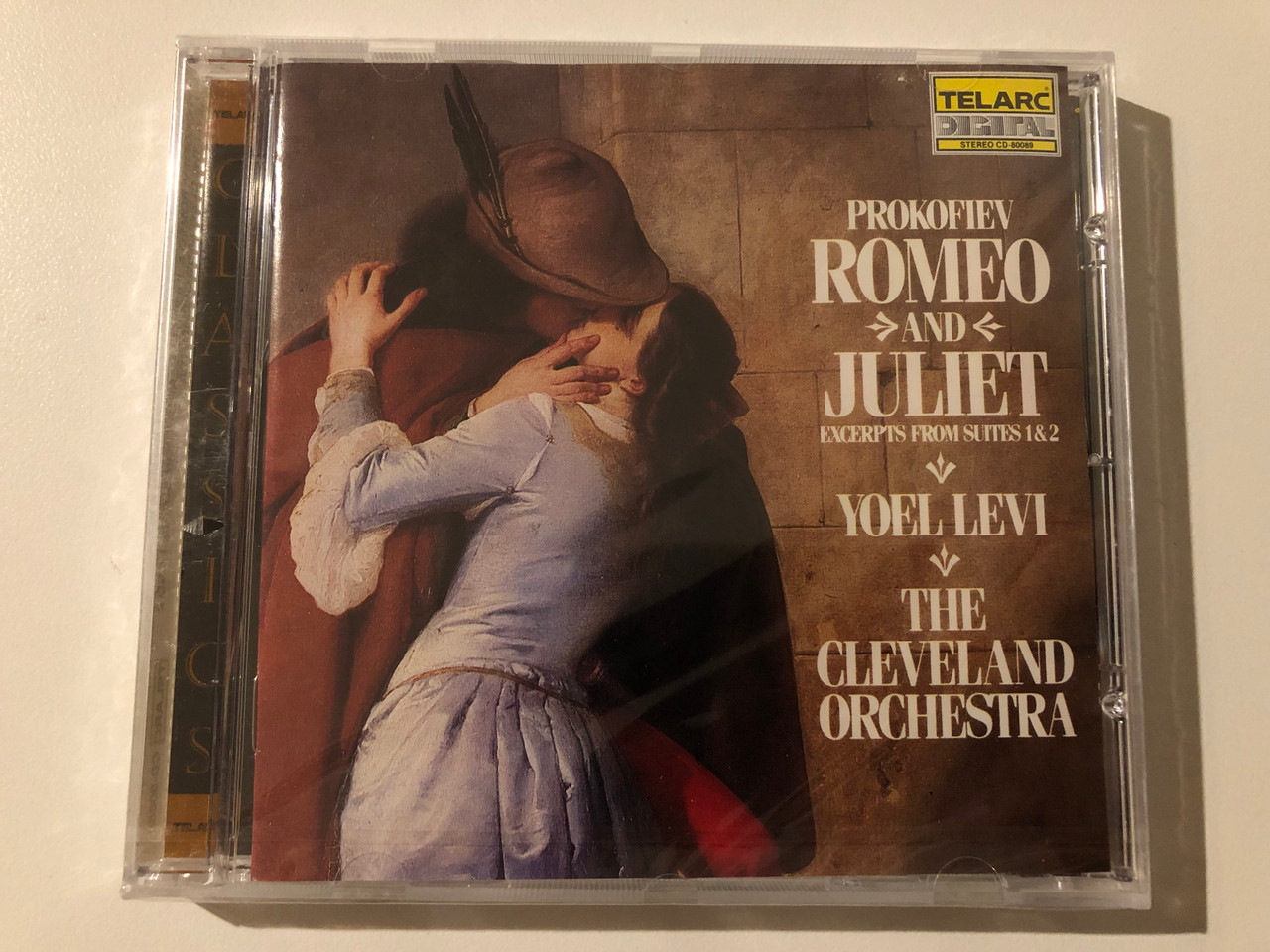 https://cdn10.bigcommerce.com/s-62bdpkt7pb/products/0/images/247918/Prokofiev_-_Romeo_And_Juliet_-_Excerpts_From_Suites_1_2_Yoel_Levi_The_Cleveland_Orchestra_Telarc_Audio_CD_CD-80089_1__62285.1660282558.1280.1280.JPG?c=2&_gl=1*1v57q7x*_ga*MjA2NTIxMjE2MC4xNTkwNTEyNTMy*_ga_WS2VZYPC6G*MTY2MDI4MTY1Ni41MjUuMS4xNjYwMjgyNDAyLjI5
