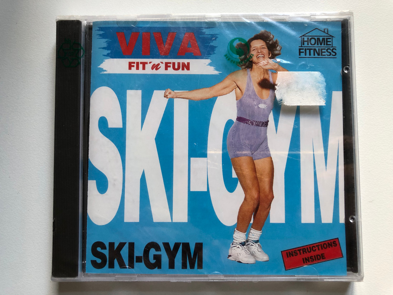 https://cdn10.bigcommerce.com/s-62bdpkt7pb/products/0/images/248276/SKI-GYM_-_Instructions_Inside_Home_Fitness_Viva_Fit_n_Fun_Audio_CD_CD_1707-2_1__01475.1660589816.1280.1280.JPG?c=2&_gl=1*kj7m3g*_ga*MjA2NTIxMjE2MC4xNTkwNTEyNTMy*_ga_WS2VZYPC6G*MTY2MDU3OTI1My41MjguMS4xNjYwNTg5NDAyLjMy