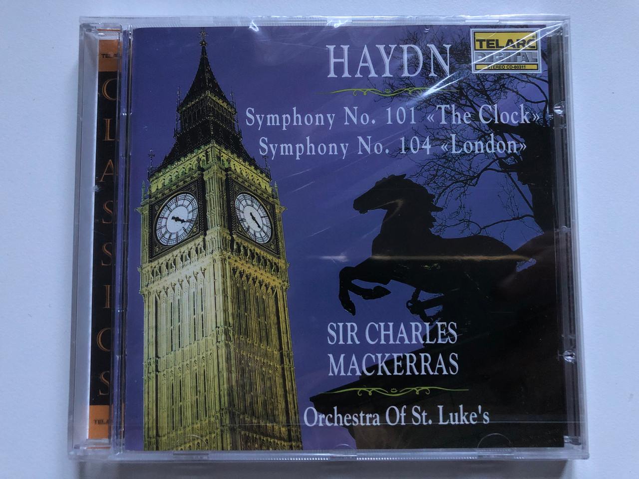 https://cdn10.bigcommerce.com/s-62bdpkt7pb/products/0/images/248468/Haydn_-_Symphony_No._101_The_Clock_Symphony_No._104_London_-_Sir_Charles_Mackerras_Orchestra_Of_St._Lukes_Telarc_Audio_CD_1992_CD-80311_1__55910.1660676238.1280.1280.JPG?c=2&_gl=1*1eslt02*_ga*MjA2NTIxMjE2MC4xNTkwNTEyNTMy*_ga_WS2VZYPC6G*MTY2MDY2NTkyNC41MjkuMS4xNjYwNjc1NjEwLjU2LjAuMA..