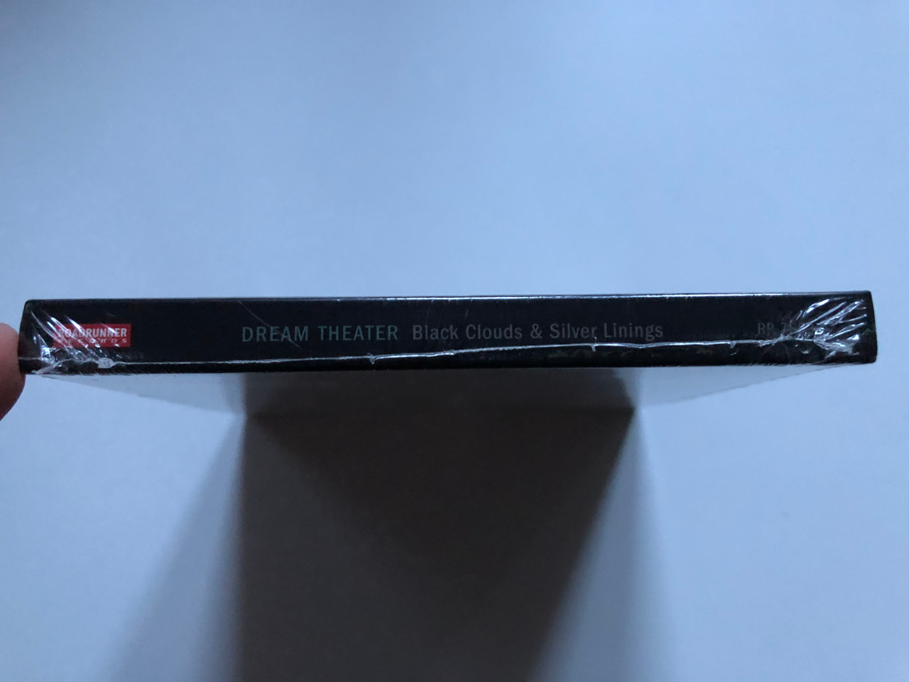 https://cdn10.bigcommerce.com/s-62bdpkt7pb/products/0/images/248789/Dream_Theater_Black_Clouds_Silver_Linings_3_CD_Deluxe_Edition_includes_6_Newly_Recorded_Cover_Songs_Instrumental_Mixes_of_the_Entire_Album._Expanded_Artwork_Roadrunner_Records_Audio_C_3__38094.1660751054.1280.1280.JPG?c=2&_gl=1*138ikzz*_ga*MjA2NTIxMjE2MC4xNTkwNTEyNTMy*_ga_WS2VZYPC6G*MTY2MDc0NjA3MS41MzAuMS4xNjYwNzUxMDg2LjYwLjAuMA..