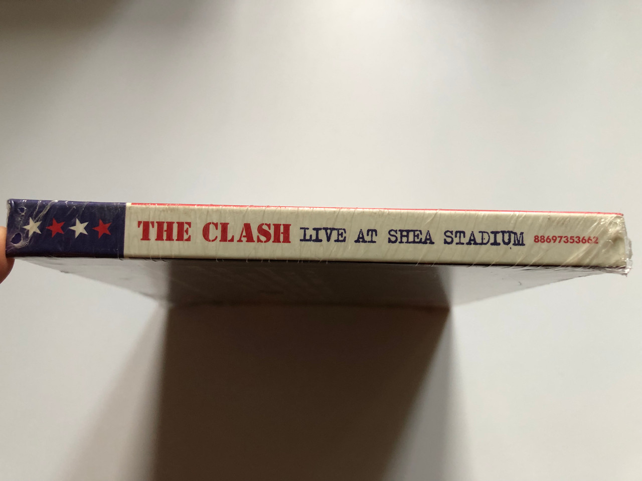 https://cdn10.bigcommerce.com/s-62bdpkt7pb/products/0/images/249237/The_Clash_Live_At_Shea_Stadium_Limited_Deluxe_Edition_With_24_Page_Booklet_October_13th_1982_Shea_Stadion_New_York_Experience_The_Intensity_Of_The_Clash_Live_Sony_BMG_Music_Enterta_3__90267.1660840826.1280.1280.JPG?c=2&_gl=1*s92qh7*_ga*MjA2NTIxMjE2MC4xNTkwNTEyNTMy*_ga_WS2VZYPC6G*MTY2MDgyNjg1NS41MzEuMS4xNjYwODQwODA2LjYwLjAuMA..