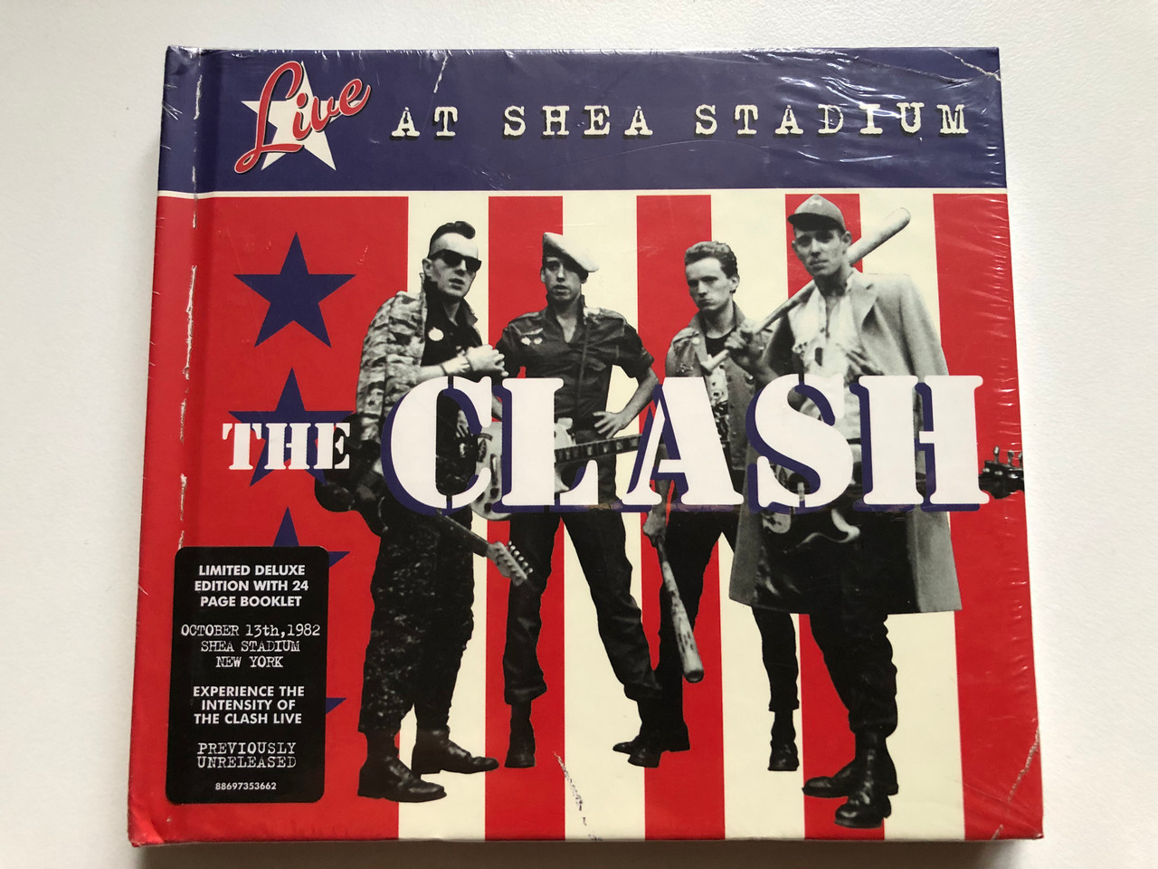 https://cdn10.bigcommerce.com/s-62bdpkt7pb/products/0/images/249239/The_Clash_Live_At_Shea_Stadium_Limited_Deluxe_Edition_With_24_Page_Booklet_October_13th_1982_Shea_Stadion_New_York_Experience_The_Intensity_Of_The_Clash_Live_Sony_BMG_Music_Entertain_1__42460.1660840846.1280.1280.JPG?c=2&_gl=1*1cxifqd*_ga*MjA2NTIxMjE2MC4xNTkwNTEyNTMy*_ga_WS2VZYPC6G*MTY2MDgyNjg1NS41MzEuMS4xNjYwODQwODA2LjYwLjAuMA..