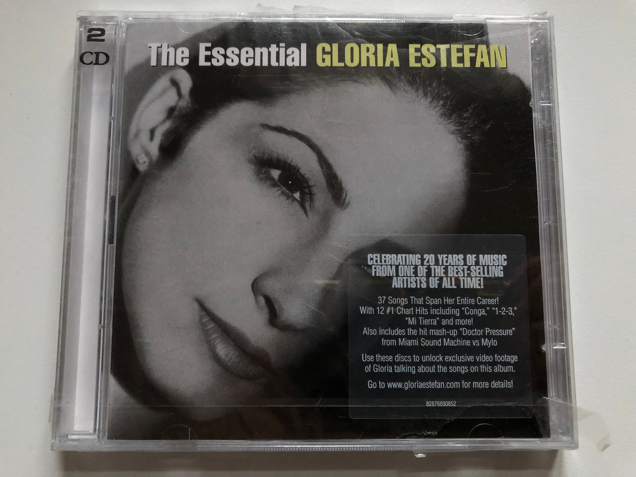 https://cdn10.bigcommerce.com/s-62bdpkt7pb/products/0/images/250026/The_Essential_Gloria_Estefan_Celebrating_20_Years_Of_Music_From_One_Of_The_Best-Selling_Artists_Of_All_Time_37_Songs_That_Span_Her_Entire_Carrer_With_12_1_Chart_Hits_including_Conga_1__76007.1661162344.1280.1280.JPG?c=2&_gl=1*1idsefy*_ga*MjA2NTIxMjE2MC4xNTkwNTEyNTMy*_ga_WS2VZYPC6G*MTY2MTE1MDA1NS41MzMuMS4xNjYxMTYyMDk3LjUyLjAuMA..