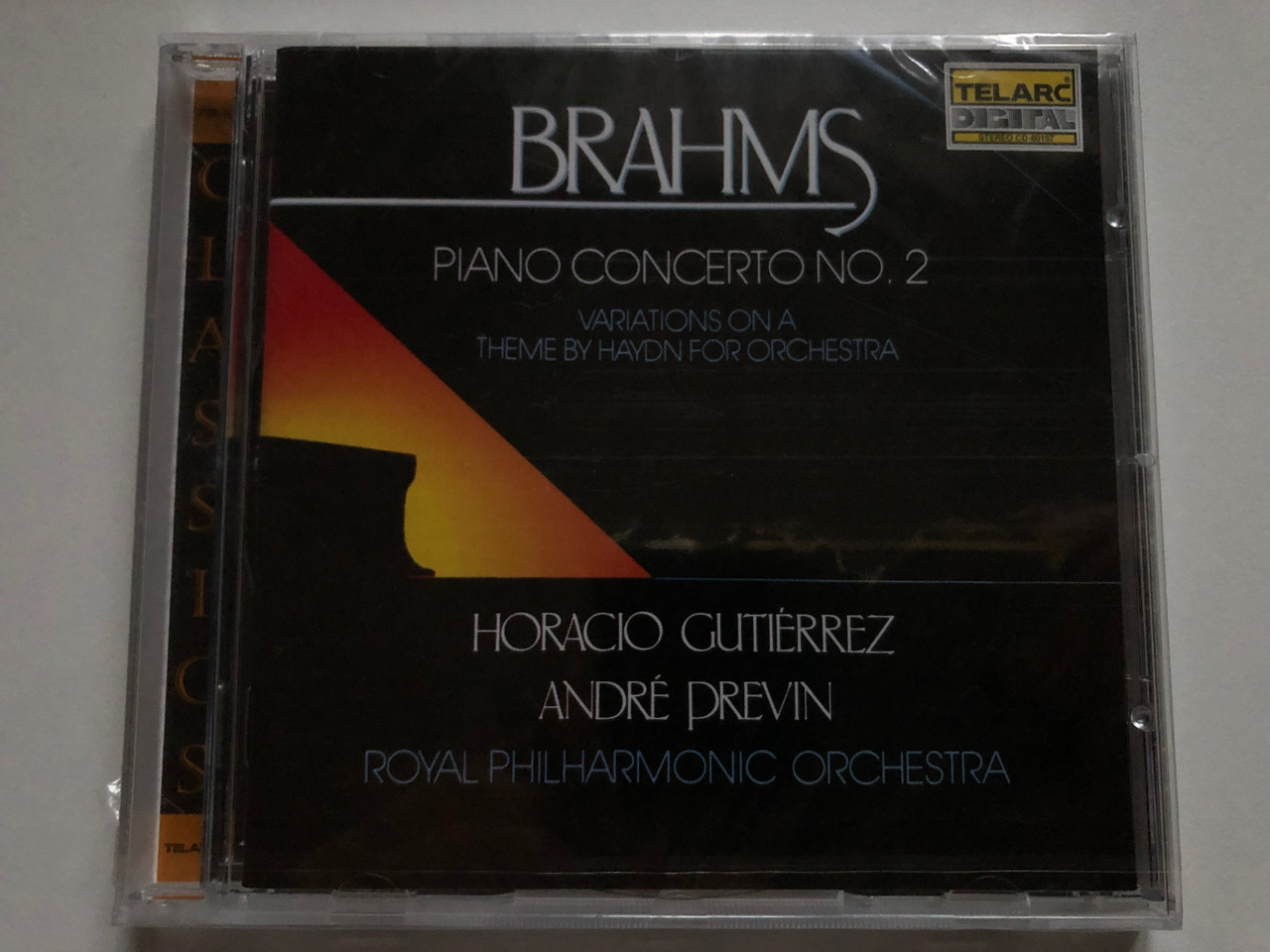 https://cdn10.bigcommerce.com/s-62bdpkt7pb/products/0/images/250360/Brahms_-_Piano_Concerto_No._2_-_Variations_on_a_Theme_by_Haydn_Horacio_Gutierrez_Andre_Previn_Royal_Philharmonic_Orchestra_Telarc_Audio_CD_1989_CD-80197_1__67344.1661228079.1280.1280.JPG?c=2&_gl=1*12f0obx*_ga*MjA2NTIxMjE2MC4xNTkwNTEyNTMy*_ga_WS2VZYPC6G*MTY2MTIyNzYwMC41MzQuMS4xNjYxMjI3OTUwLjMzLjAuMA..
