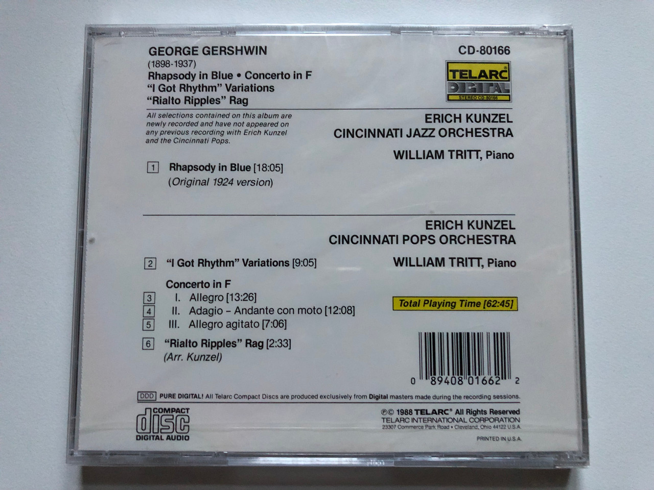 https://cdn10.bigcommerce.com/s-62bdpkt7pb/products/0/images/250365/Gershwin_Rhapsody_In_Blue_Original_1924_Version_Concerto_In_F_I_Got_Rhythm_Variations_Rialto_Ripples_Rag_Erich_Kunzel_Cincinnati_Jazz_Orchestra_Cincinnati_Pops_Orchestra_William_Tri__15202.1661228588.1280.1280.JPG?c=2&_gl=1*8rnhv9*_ga*MjA2NTIxMjE2MC4xNTkwNTEyNTMy*_ga_WS2VZYPC6G*MTY2MTIyNzYwMC41MzQuMS4xNjYxMjI4MjA3LjQxLjAuMA..