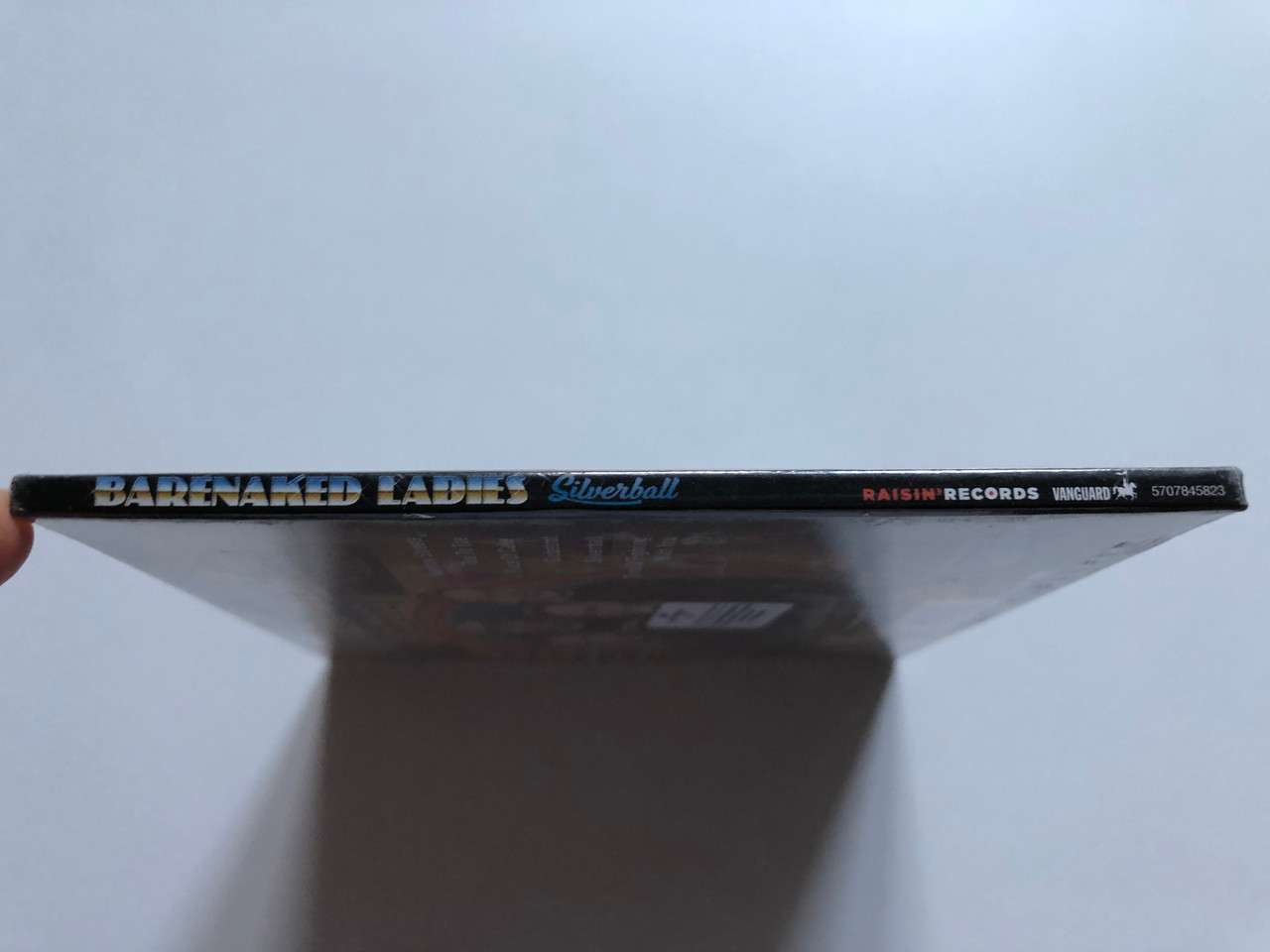 https://cdn10.bigcommerce.com/s-62bdpkt7pb/products/0/images/251042/Barenaked_Ladies_Silverball_Raisin_Records_Audio_CD_2015_5707845823_3__33972.1661330559.1280.1280.JPG?c=2&_gl=1*1xfjaf3*_ga*MjA2NTIxMjE2MC4xNTkwNTEyNTMy*_ga_WS2VZYPC6G*MTY2MTMxOTg5Ni41MzYuMS4xNjYxMzMwNDgxLjUzLjAuMA..