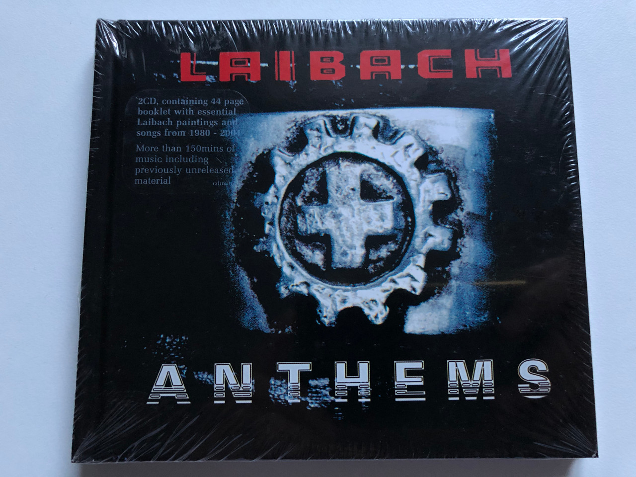https://cdn10.bigcommerce.com/s-62bdpkt7pb/products/0/images/251074/Laibach_Anthems_2CD_containing_44_page_booklet_with_essential_Laibach_paintings_and_songs_from_1980-2004_More_than_150mins_of_music_including_previously_unreleased_material_Mute_2x_Audi_1__31960.1661334883.1280.1280.JPG?c=2&_gl=1*17tzp61*_ga*MjA2NTIxMjE2MC4xNTkwNTEyNTMy*_ga_WS2VZYPC6G*MTY2MTMxOTg5Ni41MzYuMS4xNjYxMzM0Njc2LjU3LjAuMA..