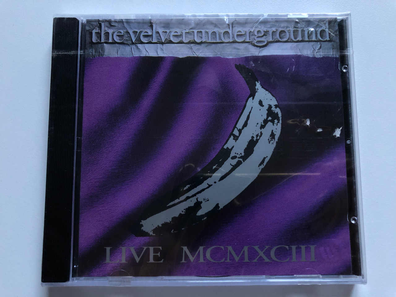 https://cdn10.bigcommerce.com/s-62bdpkt7pb/products/0/images/251076/The_Velvet_Underground_Live_MCMXCIII_Sire_Audio_CD_1993_9362-45465-2_1__63914.1661335355.1280.1280.JPG?c=2&_gl=1*1xc08n5*_ga*MjA2NTIxMjE2MC4xNTkwNTEyNTMy*_ga_WS2VZYPC6G*MTY2MTMxOTg5Ni41MzYuMS4xNjYxMzM1MjczLjYwLjAuMA..