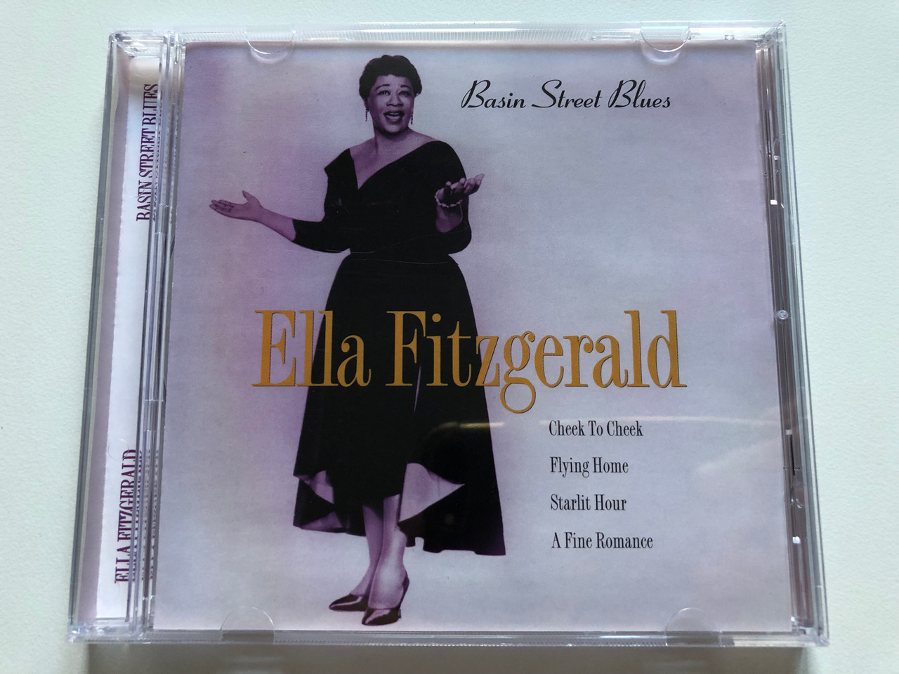 https://cdn10.bigcommerce.com/s-62bdpkt7pb/products/0/images/251796/Ella_Fitzgerald_Basin_Street_Blues_Cheek_To_Cheek_Flying_Home_Starlit_Hour_A_Fine_Romance_A_Play_Collection_Audio_CD_1997_10166-2_1__79782.1661513551.1280.1280.JPG?c=2&_gl=1*1rvn3l7*_ga*MjA2NTIxMjE2MC4xNTkwNTEyNTMy*_ga_WS2VZYPC6G*MTY2MTUwOTczMi41NDAuMS4xNjYxNTEzNTQ0LjYwLjAuMA..