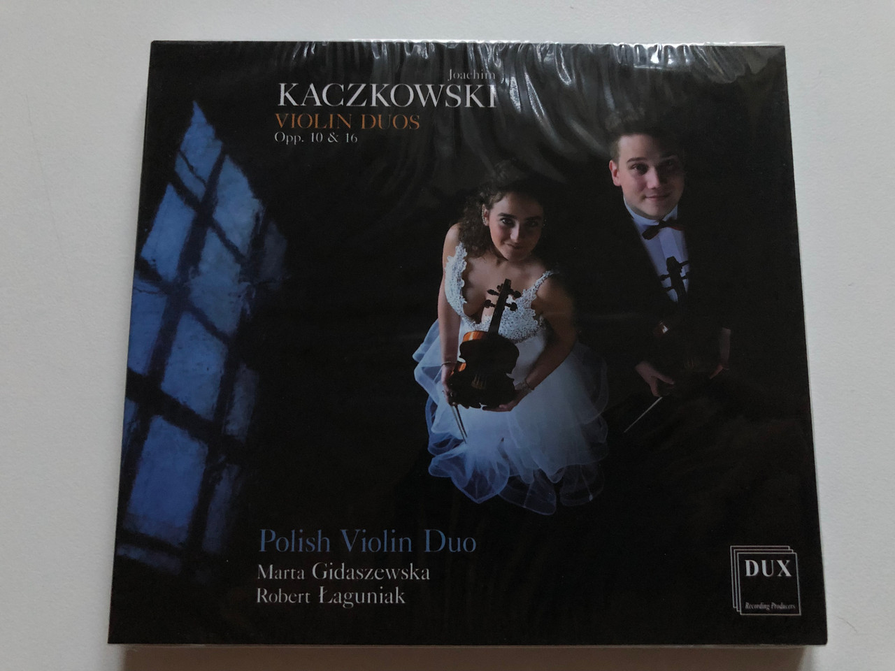 https://cdn10.bigcommerce.com/s-62bdpkt7pb/products/0/images/252751/Joachim_Kaczkowski_-_Violin_Duos_Opp._10_16_Polish_Violin_Duo_Marta_Gidaszewska_Robert_Laguniak_DUX_Recording_Producers_Audio_CD_2020_DUX_1714_1__12185.1661796643.1280.1280.JPG?c=2&_gl=1*1v7slpr*_ga*MjA2NTIxMjE2MC4xNTkwNTEyNTMy*_ga_WS2VZYPC6G*MTY2MTc4MjI5Ny41NDEuMS4xNjYxNzk2NjA2LjMwLjAuMA..