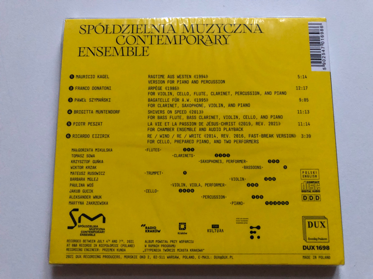 https://cdn10.bigcommerce.com/s-62bdpkt7pb/products/0/images/252817/Spdzielnia_Muzyczna_Contemporary_Ensemble_DUX_Recording_Producers_Audio_CD_2021_DUX_1698_2__74083.1661864971.1280.1280.JPG?c=2&_gl=1*1f39drh*_ga*MjA2NTIxMjE2MC4xNTkwNTEyNTMy*_ga_WS2VZYPC6G*MTY2MTg2MzUzNi41NDIuMS4xNjYxODY1MDUzLjYwLjAuMA..
