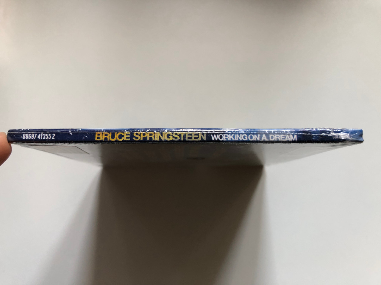 https://cdn10.bigcommerce.com/s-62bdpkt7pb/products/0/images/252995/Bruce_Springsteen_Working_On_A_Dream_13_New_Songs_with_the_E_Street_Band_including_My_Lucky_Day_The_Wrestler_Outlaw_Pete_Columbia_Audio_CD_2009_88697_41355_2_3__32449.1661969214.1280.1280.JPG?c=2&_gl=1*1brq8nz*_ga*MjA2NTIxMjE2MC4xNTkwNTEyNTMy*_ga_WS2VZYPC6G*MTY2MTk1NzAwOS41NDMuMS4xNjYxOTY4OTkwLjU2LjAuMA..