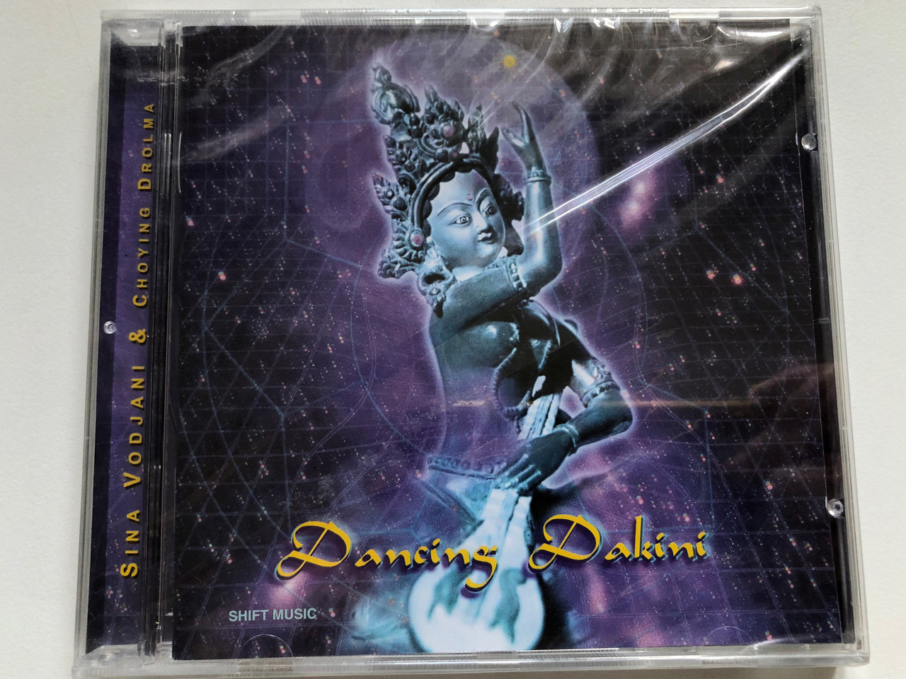 https://cdn10.bigcommerce.com/s-62bdpkt7pb/products/0/images/253014/Sina_Vodjani_Choying_Drolma_Dancing_Dakini_Pastels_Audio_CD_2000_203420-213_1__76504.1662035290.1280.1280.JPG?c=2&_gl=1*hfhxhj*_ga*MjA2NTIxMjE2MC4xNTkwNTEyNTMy*_ga_WS2VZYPC6G*MTY2MjAzNDI0My41NDQuMS4xNjYyMDM0OTMwLjYwLjAuMA..