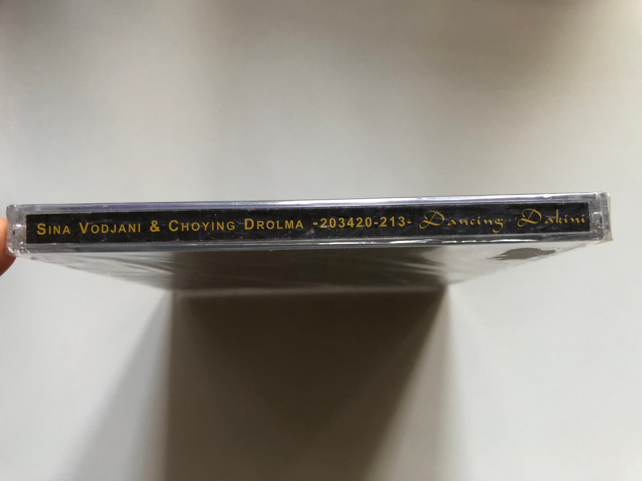 https://cdn10.bigcommerce.com/s-62bdpkt7pb/products/0/images/253016/Sina_Vodjani_Choying_Drolma_Dancing_Dakini_Pastels_Audio_CD_2000_203420-213_3__57101.1662035301.1280.1280.JPG?c=2&_gl=1*hfhxhj*_ga*MjA2NTIxMjE2MC4xNTkwNTEyNTMy*_ga_WS2VZYPC6G*MTY2MjAzNDI0My41NDQuMS4xNjYyMDM0OTMwLjYwLjAuMA..