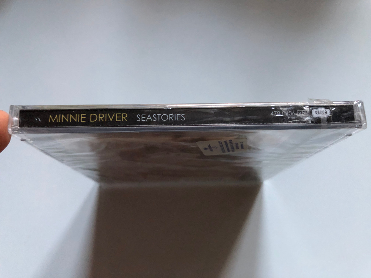 https://cdn10.bigcommerce.com/s-62bdpkt7pb/products/0/images/253174/Minnie_Driver_Seastories_Featuring_Beloved_and_Stars_Satellites_Guest_appearances_from_Ryan_Adams_The_Cardinals_Liz_Phair_and_Rami_Jaffee_The_Wallflowers_Decca_Audio_CD_3__13652.1662147565.1280.1280.JPG?c=2&_gl=1*17bct8j*_ga*MjA2NTIxMjE2MC4xNTkwNTEyNTMy*_ga_WS2VZYPC6G*MTY2MjE0NTE4Ny41NTAuMS4xNjYyMTQ3Mjc1LjM2LjAuMA..