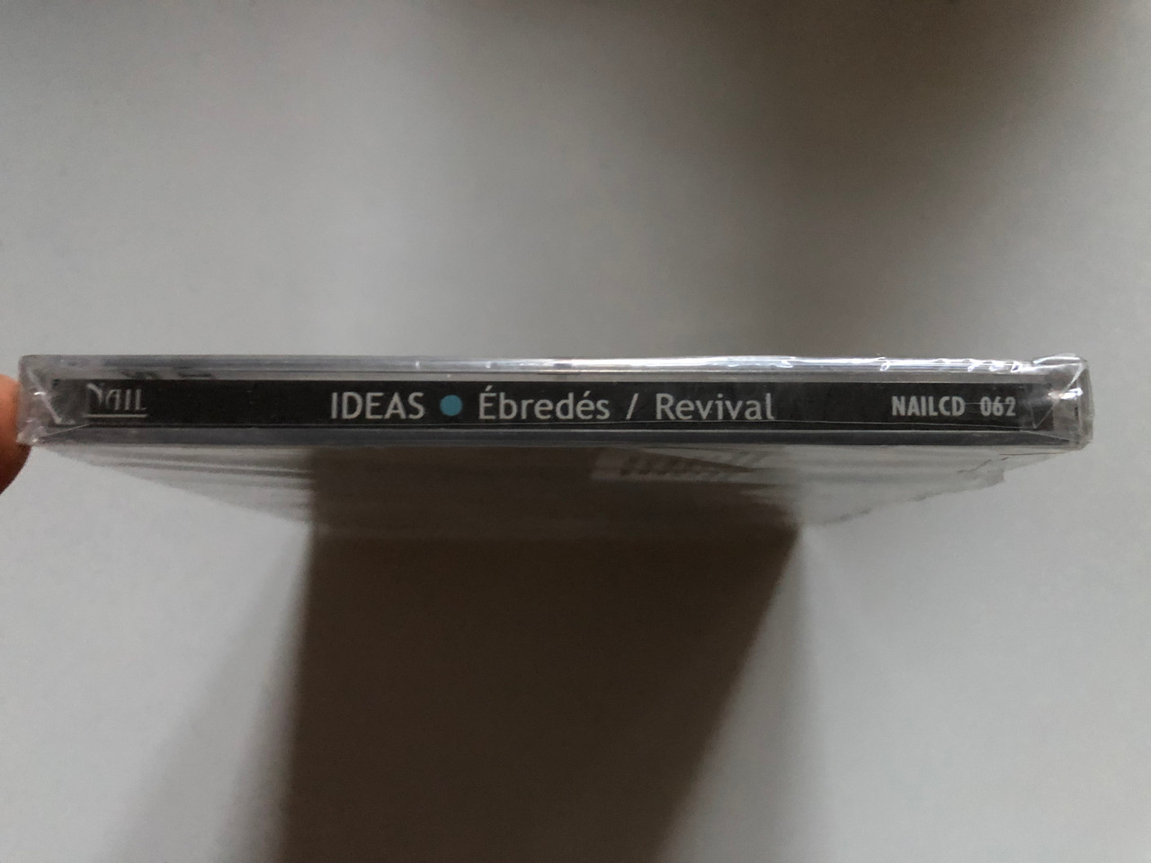 https://cdn10.bigcommerce.com/s-62bdpkt7pb/products/0/images/253562/Ideas_breds_Revival_Nail_Records_2x_Audio_CD_2006_NAILCD_062_3__71111.1663571278.1280.1280.JPG?c=2&_gl=1*1a3blbr*_ga*MjA2NTIxMjE2MC4xNTkwNTEyNTMy*_ga_WS2VZYPC6G*MTY2MzU2Njc3MC41NTEuMS4xNjYzNTcxMDQyLjI0LjAuMA..