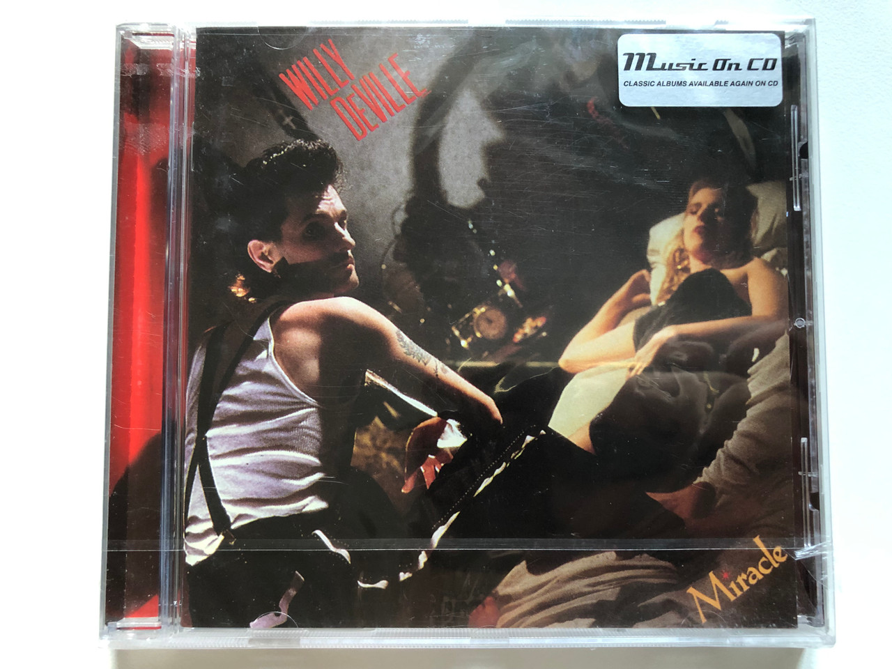 https://cdn10.bigcommerce.com/s-62bdpkt7pb/products/0/images/253625/Willy_DeVille_Miracle_Music_On_CD_Audio_CD_2016_MOCCD13278_1__60971.1663580148.1280.1280.JPG?c=2&_gl=1*p9eitf*_ga*MjA2NTIxMjE2MC4xNTkwNTEyNTMy*_ga_WS2VZYPC6G*MTY2MzU2Njc3MC41NTEuMS4xNjYzNTgwMDg3LjYwLjAuMA..