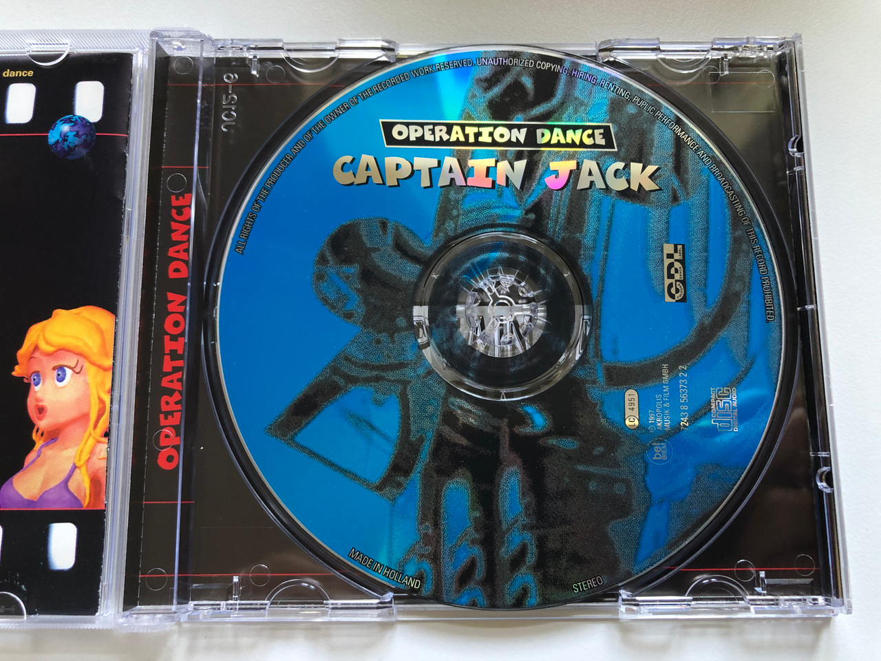 https://cdn10.bigcommerce.com/s-62bdpkt7pb/products/0/images/254014/Captain_Jack_Operation_Dance_CDL_-_Cologne_Dance_Label_Audio_CD_1997_724385637322_3__65122.1663778811.1280.1280.JPG?c=2&_gl=1*s0a3yq*_ga*MjA2NTIxMjE2MC4xNTkwNTEyNTMy*_ga_WS2VZYPC6G*MTY2Mzc3NzM1OC41NTYuMS4xNjYzNzc4NzAwLjQ4LjAuMA..