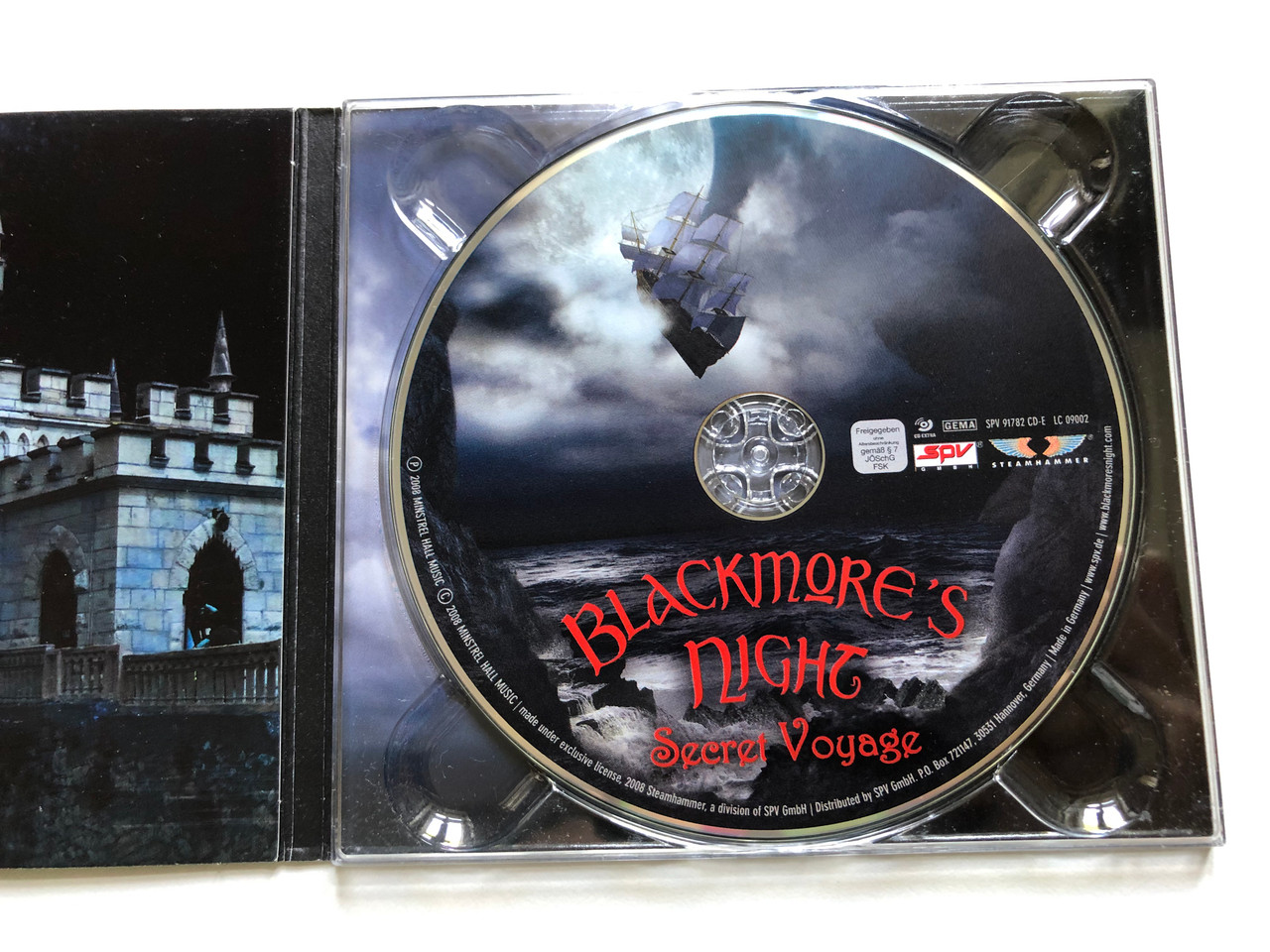 https://cdn10.bigcommerce.com/s-62bdpkt7pb/products/0/images/254037/Blackmores_Night_Secret_Voyage_Steamhammer_Audio_CD_2008_SPV_91782_CD-E_2__47300.1663780790.1280.1280.JPG?c=2&_gl=1*hip6ue*_ga*MjA2NTIxMjE2MC4xNTkwNTEyNTMy*_ga_WS2VZYPC6G*MTY2Mzc3NzM1OC41NTYuMS4xNjYzNzgwNzUyLjYwLjAuMA..