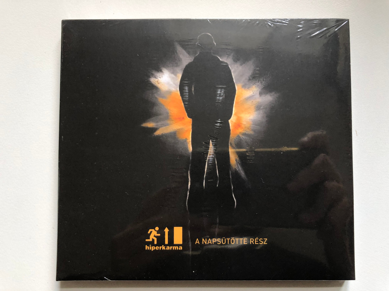 https://cdn10.bigcommerce.com/s-62bdpkt7pb/products/0/images/254064/Hiperkarma_A_Napsttte_Rsz_Interwurlitzer_Audio_CD_2018_IW003_1__30115.1663828691.1280.1280.JPG?c=2&_gl=1*194yvzr*_ga*MjA2NTIxMjE2MC4xNTkwNTEyNTMy*_ga_WS2VZYPC6G*MTY2MzgyNjg3OC41NTcuMS4xNjYzODI4NTU3LjU2LjAuMA..