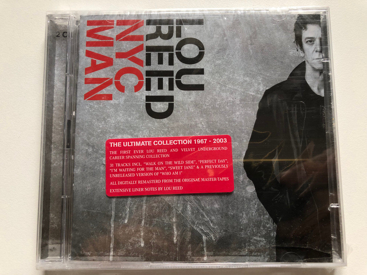 https://cdn10.bigcommerce.com/s-62bdpkt7pb/products/0/images/254111/Lou_Reed_NYC_Man_The_Ultimate_Collection_1967-2003_The_First_Ever_Lou_Reed_And_Velvet_Underground_Career_Spanning_Collection_31_Tracks_Incl._Walk_On_The_Wild_Side_Perfect_Day_1__91720.1663836008.1280.1280.JPG?c=2&_gl=1*zesv58*_ga*MjA2NTIxMjE2MC4xNTkwNTEyNTMy*_ga_WS2VZYPC6G*MTY2MzgyNjg3OC41NTcuMS4xNjYzODM1ODg5LjYwLjAuMA..