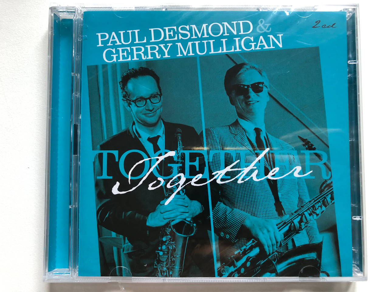 https://cdn10.bigcommerce.com/s-62bdpkt7pb/products/0/images/254273/Paul_Desmond_Gerry_Mulligan_-_Together_Factory_Of_Sounds_2x_Audio_CD_2018_FOS_2205155_1__26042.1663936530.1280.1280.JPG?c=2&_gl=1*q2iwr8*_ga*MjA2NTIxMjE2MC4xNTkwNTEyNTMy*_ga_WS2VZYPC6G*MTY2MzkzNjM1OS41NjEuMS4xNjYzOTM2MzgxLjM4LjAuMA..